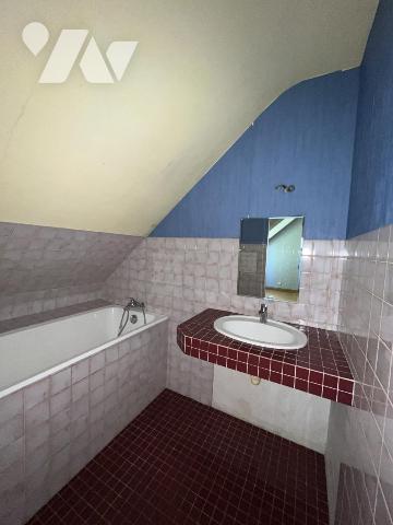 Pavillon sur sous-sol entérré