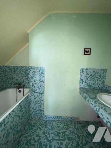 Pavillon sur sous-sol entérré