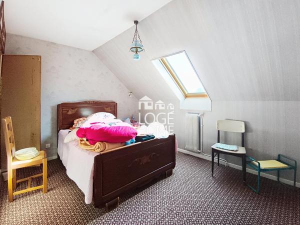 Maison 3 chambres + bureau , sous-sol complet, jardin et garage en secteur résidentiel