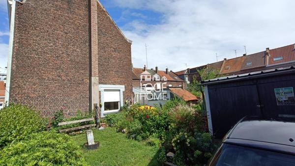 Mouvaux vauban, 1930 semi-individuelle à travaux avec 3chs, jardin, garage et place de parking.