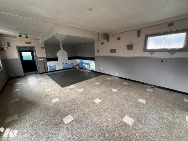 IMMEUBLE DE COMMERCE et d'HABITATION