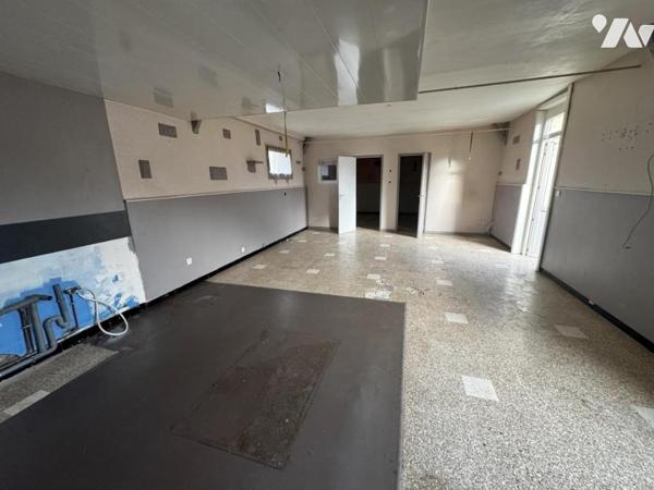 IMMEUBLE DE COMMERCE et d'HABITATION