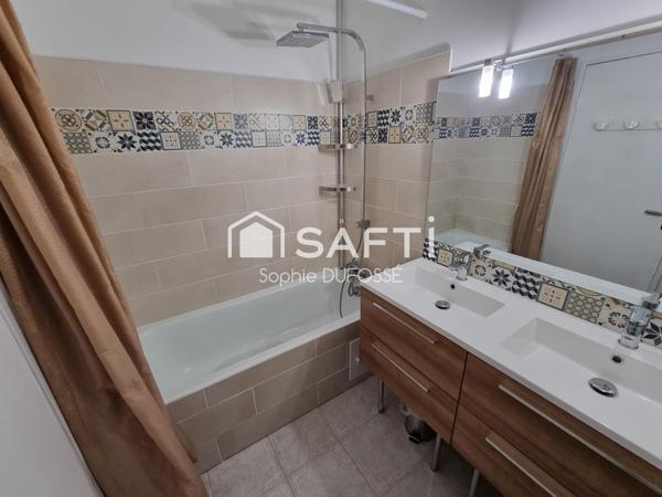 Appartement T4 lumineux avec grand balcon filant, cave et garage