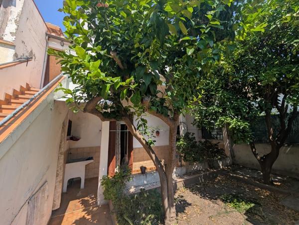 Maison divisée en 2 appartements T3 avec jardins et garage
