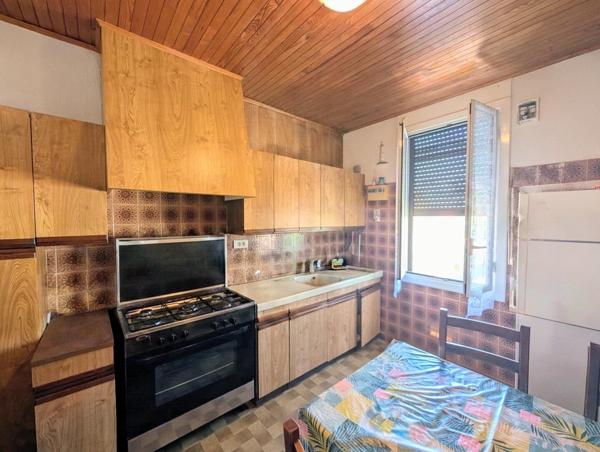 Maison divisée en 2 appartements T3 avec jardins et garage