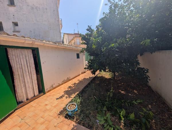 Maison divisée en 2 appartements T3 avec jardins et garage
