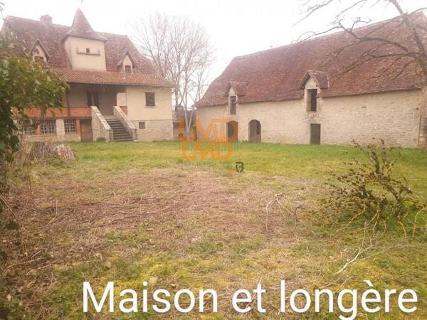 corps de ferme et sa longère en pierre avec terrain à Villeneuve