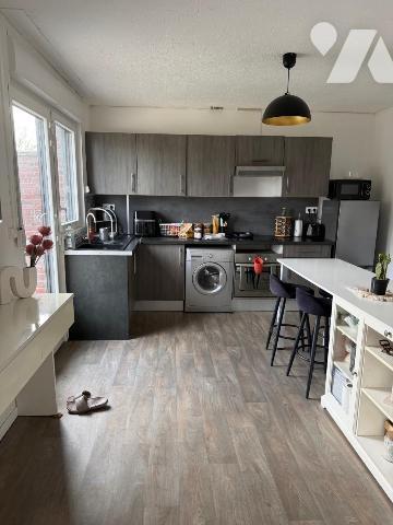 BRUAY SUR ESCAUT IMMEUBLE DE RAPPORT AVEC GARAGE ET JARDIN 