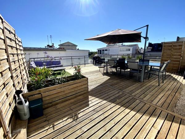 Centre-ville, terrasse ensoleillée, place de parking, un confort de vie