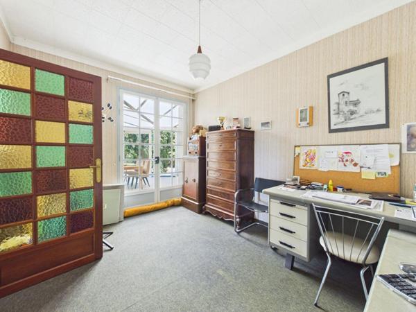 Maison de 179 m2 à Loudun , 5 chambres, grand jardin arboré, garage, vaste sous sol