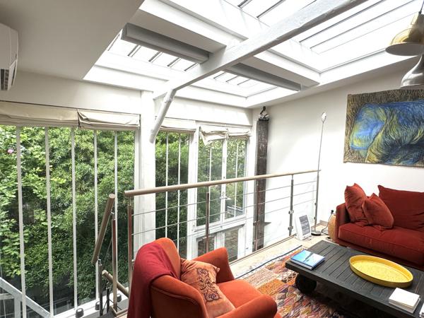 Paris (75014) RARE ! Un atelier d'artiste chargé d'histoire transformé en un magnifique logement en duplex.