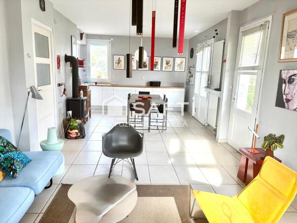 Maison familiale avec piscine et terrain aboré de 700 m²