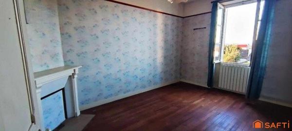 MAISON DE VILLE AVEC JARDIN ET GARAGE