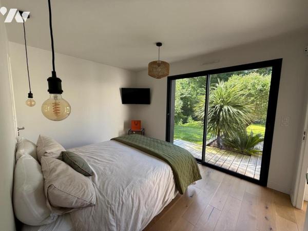 MURS-ERIGNE CONTEMPORAINE EN EXCELLENT ETAT AVEC JOLI JARDIN 