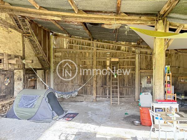 GRANGE A RENOVER 100 M2 EN LISIERE DE FORET VUE EXCEPTIONNELLE SUR 4 HECTARES ENVIRON