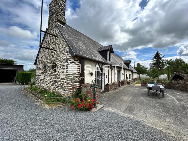 Maison, style Longère en pierre, avec terrain tout autour et une dépendance idéale pour gîte