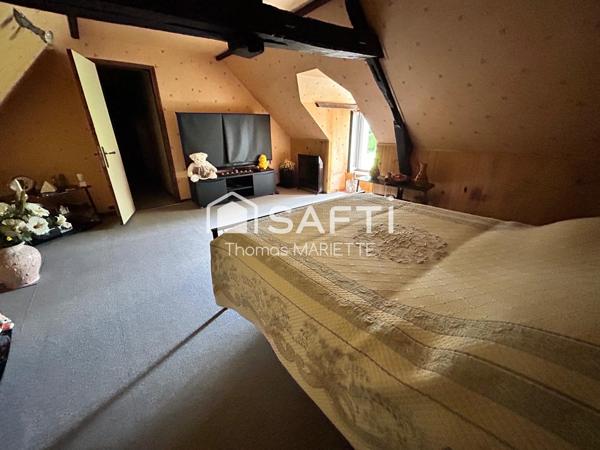 Maison, style Longère en pierre, avec terrain tout autour et une dépendance idéale pour gîte