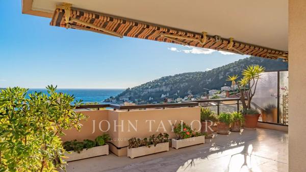 Appartement central avec vue mer et jardin privatif