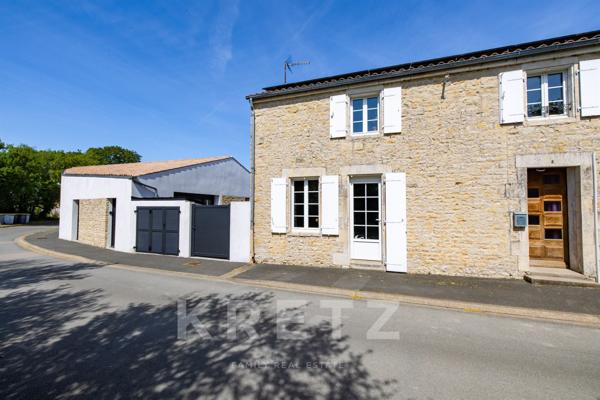 Corps de ferme devenu villa contemporaine