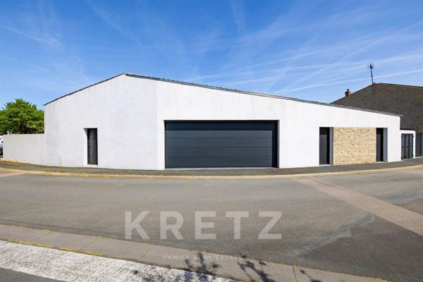 Corps de ferme devenu villa contemporaine
