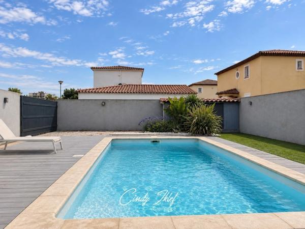 Marignane, Quartier Les Beugons: Maison T4 de 97 m2, de plain-pied et exposée Sud, avec jardin, piscine et un garage de 16 m2.
