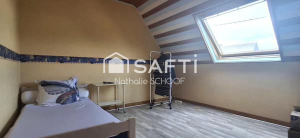 À vendre – Maison avec jardin et garage au cœur de Baud