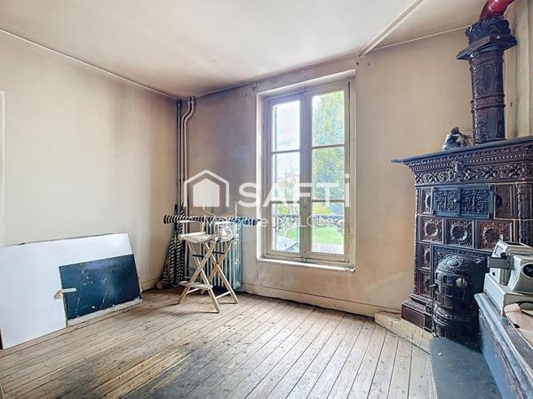 Grande maison familiale avec jardin arboré