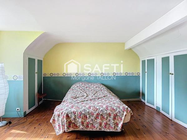 Grande maison familiale avec jardin arboré