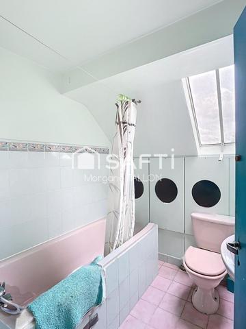 Grande maison familiale avec jardin arboré