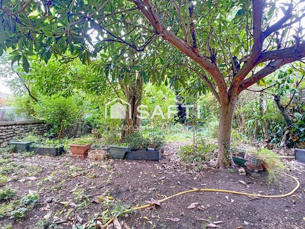 Grande maison familiale avec jardin arboré