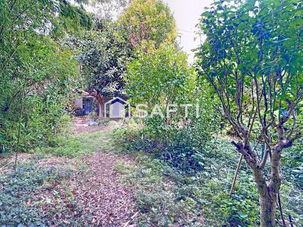 Grande maison familiale avec jardin arboré