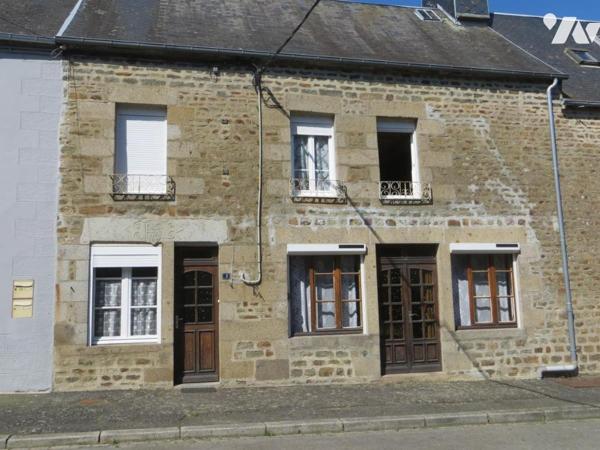 Dans bourg avec commerces et école LANDELLES ET COUPIGNY