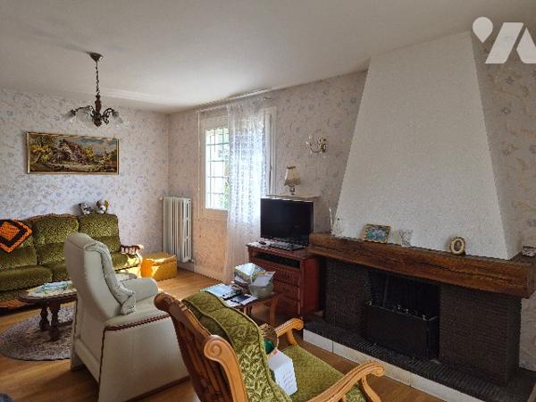 Une maison à usage d'habitation comprenant :