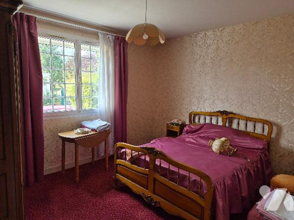 Une maison à usage d'habitation comprenant :
