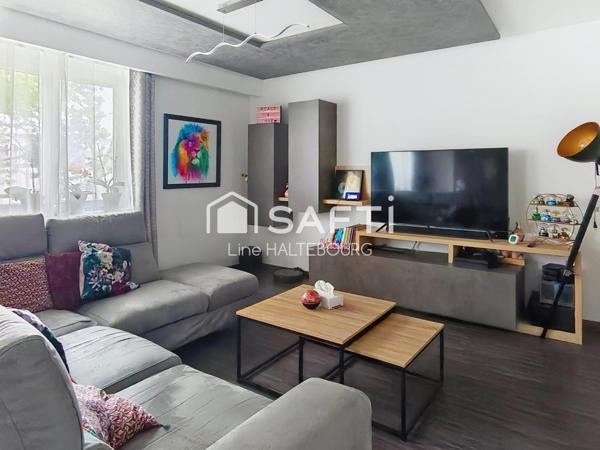 Coup de cœur assuré pour ce 3 pièces moderne avec balcon et cave !