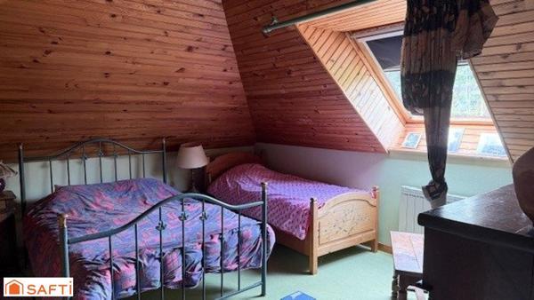 A SAISIR MAISON D'ARCHITECTE PROCHE ECOLE ET COMMERCES