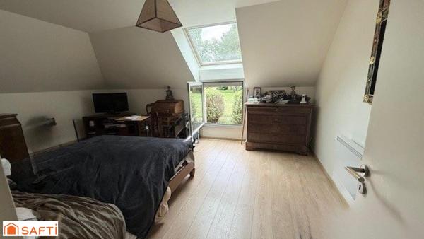 A SAISIR MAISON D'ARCHITECTE PROCHE ECOLE ET COMMERCES