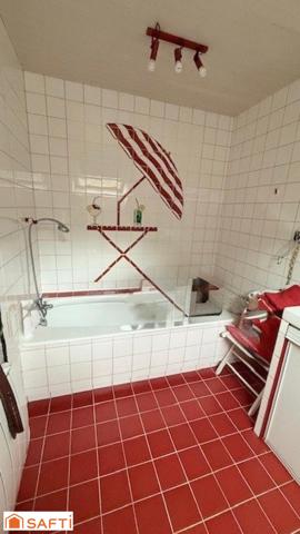 A SAISIR MAISON D'ARCHITECTE PROCHE ECOLE ET COMMERCES