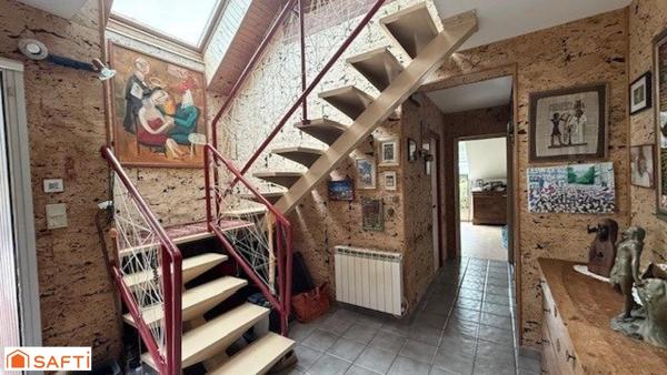 A SAISIR MAISON D'ARCHITECTE PROCHE ECOLE ET COMMERCES