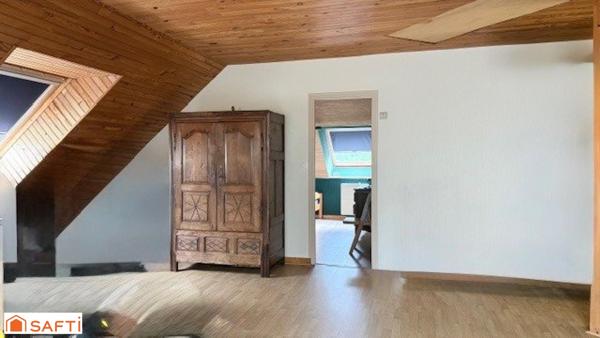 A SAISIR MAISON D'ARCHITECTE PROCHE ECOLE ET COMMERCES