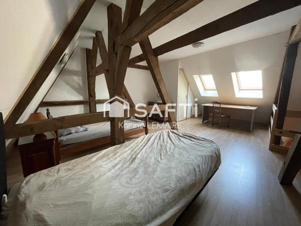 Immeuble de rapport composé de 3 logements + possibilité 2 autres