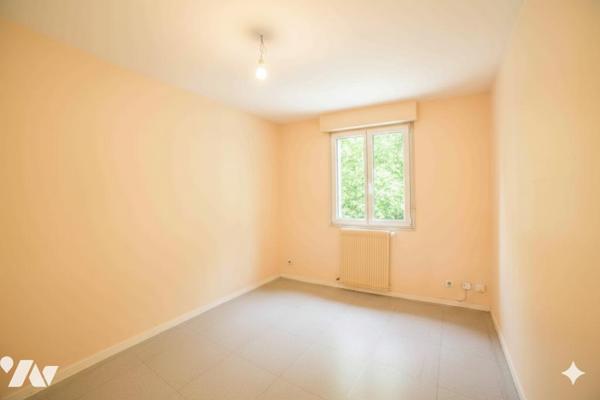 Centre ville T3 Traversant ascenseur cave et garage