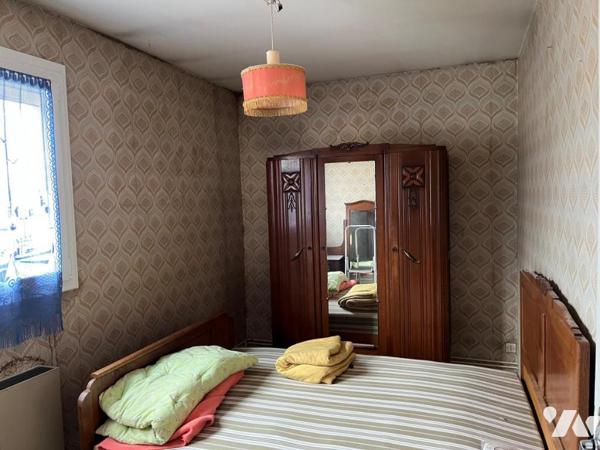 LONGVIC, maison d'habitation de type V/VI, sur 2 niveaux, avec 4 chambres, jumelé par le garage 