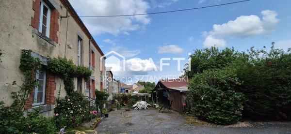 Charmante maison creusoise avec plusieurs dépendances et grand jardin arboré.