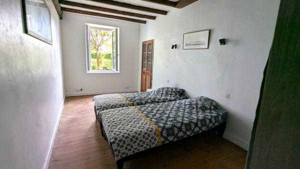 Maison ancienne à finir de restaurer avec terrain