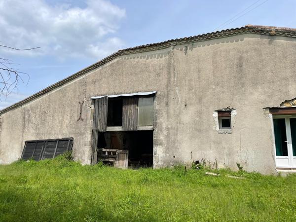 Maison en pierre avec dépendances