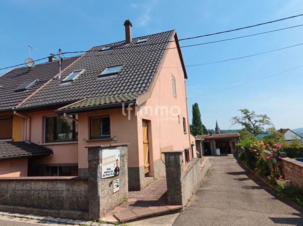 Maison mitoyenne à rénover avec fort potentiel