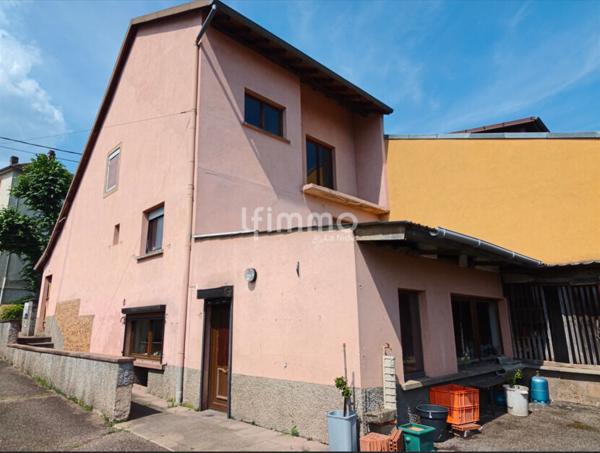 Maison mitoyenne à rénover avec fort potentiel