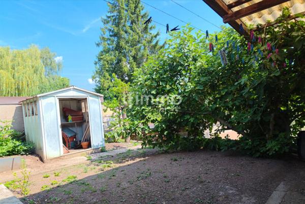 Maison mitoyenne à rénover avec fort potentiel