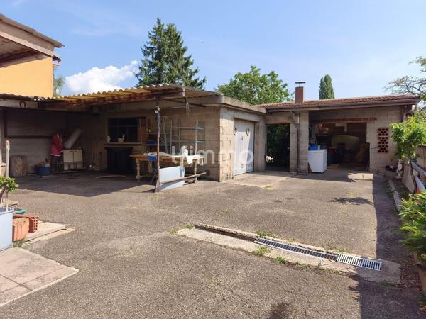 Maison mitoyenne à rénover avec fort potentiel